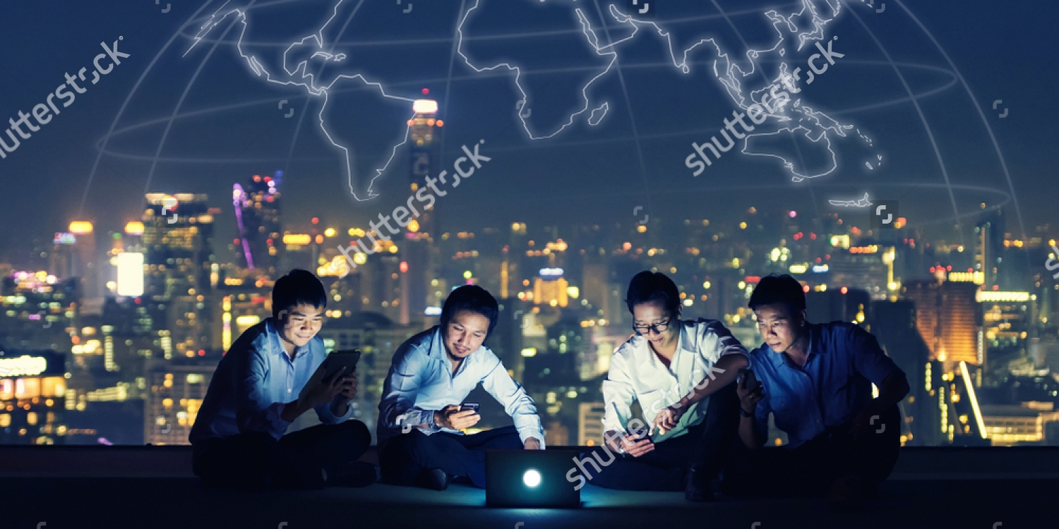 stock-photo-asian-business-group-in-casual-suits-using-smartphone-tablet-and-laptop-for-working-or-playing-1016795647_copy_1500x750